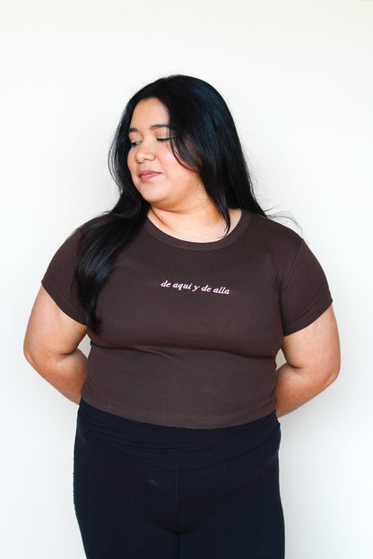 'De Aquí y De Allá' Embroidered Brown Rib Baby Tee